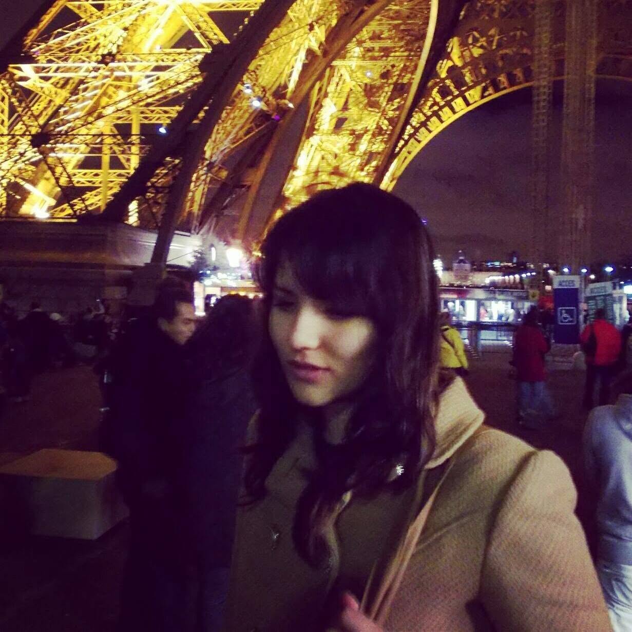 Simay Ernalbant in Paris by the Eiffel Tower
